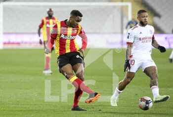 2021-04-03 - Steven Fortes of Lens, Memphis Depay of Lyon during the French championship Ligue 1 football match between RC Lens and Olympique Lyonnais (OL, Lyon) on April 3, 2021 at Stade Bollaert-Delelis in Lens, France - Photo Jean Catuffe / DPPI - RC LENS VS OLYMPIQUE LYONNAIS - FRENCH LIGUE 1 - SOCCER