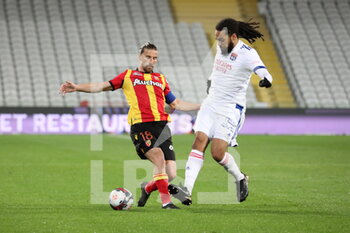2021-04-03 - Duel captain Lens Cahuzac 18 Lens during the French championship Ligue 1 football match between RC Lens and Olympique Lyonnais on April 3, 2021 at Bollaert-Delelis stadium in Lens, France - Photo Laurent Sanson / LS Medianord / DPPI - RC LENS VS OLYMPIQUE LYONNAIS - FRENCH LIGUE 1 - SOCCER