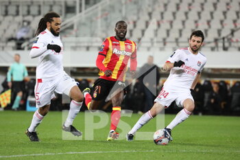 2021-04-03 - Duel HAIDARA 21 Lens and DENAYER 5 Lyon DUBOIS 14 during the French championship Ligue 1 football match between RC Lens and Olympique Lyonnais on April 3, 2021 at Bollaert-Delelis stadium in Lens, France - Photo Laurent Sanson / LS Medianord / DPPI - RC LENS VS OLYMPIQUE LYONNAIS - FRENCH LIGUE 1 - SOCCER
