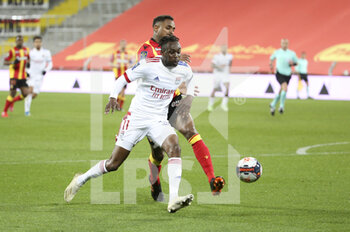 2021-04-03 - Tino Kadewere of Lyon, Steven Fortes of Lens during the French championship Ligue 1 football match between RC Lens and Olympique Lyonnais (OL, Lyon) on April 3, 2021 at Stade Bollaert-Delelis in Lens, France - Photo Jean Catuffe / DPPI - RC LENS VS OLYMPIQUE LYONNAIS - FRENCH LIGUE 1 - SOCCER