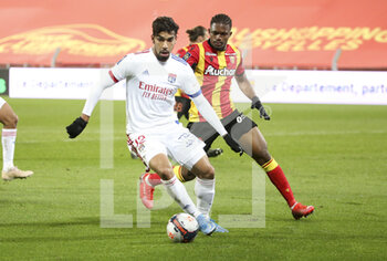 2021-04-03 - Lucas Paqueta of Lyon, Cheick Doucoure of Lens during the French championship Ligue 1 football match between RC Lens and Olympique Lyonnais (OL, Lyon) on April 3, 2021 at Stade Bollaert-Delelis in Lens, France - Photo Jean Catuffe / DPPI - RC LENS VS OLYMPIQUE LYONNAIS - FRENCH LIGUE 1 - SOCCER