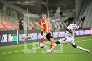 2021-04-03 - Duel CAHUZAC 18 Lens and CORNET 27 Lyon during the French championship Ligue 1 football match between RC Lens and Olympique Lyonnais on April 3, 2021 at Bollaert-Delelis stadium in Lens, France - Photo Laurent Sanson / LS Medianord / DPPI - RC LENS VS OLYMPIQUE LYONNAIS - FRENCH LIGUE 1 - SOCCER