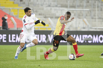 2021-04-03 - Cheick Doucoure of Lens, Lucas Paqueta of Lyon (left) during the French championship Ligue 1 football match between RC Lens and Olympique Lyonnais (OL, Lyon) on April 3, 2021 at Stade Bollaert-Delelis in Lens, France - Photo Jean Catuffe / DPPI - RC LENS VS OLYMPIQUE LYONNAIS - FRENCH LIGUE 1 - SOCCER