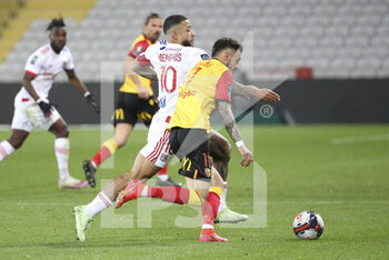 2021-04-03 - Memphis Depay of Lyon, Jonathan Clauss of Lens during the French championship Ligue 1 football match between RC Lens and Olympique Lyonnais (OL, Lyon) on April 3, 2021 at Stade Bollaert-Delelis in Lens, France - Photo Jean Catuffe / DPPI - RC LENS VS OLYMPIQUE LYONNAIS - FRENCH LIGUE 1 - SOCCER