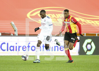 2021-04-03 - Karl Toko Ekambi of Lyon, Steven Fortes of Lens during the French championship Ligue 1 football match between RC Lens and Olympique Lyonnais (OL, Lyon) on April 3, 2021 at Stade Bollaert-Delelis in Lens, France - Photo Jean Catuffe / DPPI - RC LENS VS OLYMPIQUE LYONNAIS - FRENCH LIGUE 1 - SOCCER