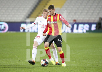 2021-04-03 - Clement Michelin of Lens, Melvin Bard of Lyon (left) during the French championship Ligue 1 football match between RC Lens and Olympique Lyonnais (OL, Lyon) on April 3, 2021 at Stade Bollaert-Delelis in Lens, France - Photo Jean Catuffe / DPPI - RC LENS VS OLYMPIQUE LYONNAIS - FRENCH LIGUE 1 - SOCCER