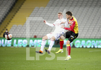 2021-04-03 - Melvin Bard of Lyon, Clement Michelin of Lens during the French championship Ligue 1 football match between RC Lens and Olympique Lyonnais (OL, Lyon) on April 3, 2021 at Stade Bollaert-Delelis in Lens, France - Photo Jean Catuffe / DPPI - RC LENS VS OLYMPIQUE LYONNAIS - FRENCH LIGUE 1 - SOCCER