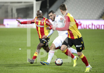 2021-04-03 - Rayan Cherki of Lyon, Gael Kakuta of Lens (left) during the French championship Ligue 1 football match between RC Lens and Olympique Lyonnais (OL, Lyon) on April 3, 2021 at Stade Bollaert-Delelis in Lens, France - Photo Jean Catuffe / DPPI - RC LENS VS OLYMPIQUE LYONNAIS - FRENCH LIGUE 1 - SOCCER