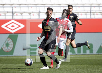 2021-04-04 - Damien Da Silva of Rennes, Boulaye Dia of Reims during the French championship Ligue 1 football match between Stade de Reims and Stade Rennais (Rennes) on April 4, 2021 at Stade Auguste Delaune in Reims, France - Photo Jean Catuffe / DPPI - STADE DE REIMS VS STADE RENNAIS (RENNES) - FRENCH LIGUE 1 - SOCCER