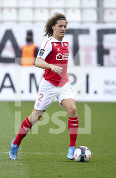 2021-04-04 - Wout Faes of Reims during the French championship Ligue 1 football match between Stade de Reims and Stade Rennais (Rennes) on April 4, 2021 at Stade Auguste Delaune in Reims, France - Photo Jean Catuffe / DPPI - STADE DE REIMS VS STADE RENNAIS (RENNES) - FRENCH LIGUE 1 - SOCCER