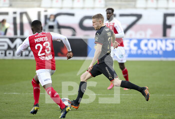 2021-04-04 - Adrien Truffert of Rennes during the French championship Ligue 1 football match between Stade de Reims and Stade Rennais (Rennes) on April 4, 2021 at Stade Auguste Delaune in Reims, France - Photo Jean Catuffe / DPPI - STADE DE REIMS VS STADE RENNAIS (RENNES) - FRENCH LIGUE 1 - SOCCER