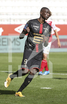 2021-04-04 - Serhou Guirassy of Rennes celebrates his goal on a penalty kick during the French championship Ligue 1 football match between Stade de Reims and Stade Rennais (Rennes) on April 4, 2021 at Stade Auguste Delaune in Reims, France - Photo Jean Catuffe / DPPI - STADE DE REIMS VS STADE RENNAIS (RENNES) - FRENCH LIGUE 1 - SOCCER