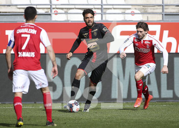 2021-04-04 - Clement Grenier of Rennes, Arber Zeneli of Reims during the French championship Ligue 1 football match between Stade de Reims and Stade Rennais (Rennes) on April 4, 2021 at Stade Auguste Delaune in Reims, France - Photo Jean Catuffe / DPPI - STADE DE REIMS VS STADE RENNAIS (RENNES) - FRENCH LIGUE 1 - SOCCER