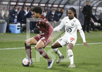 2021-04-09 - Matthieu Udol of FC Metz, Renato Sanches of Lille during the French championship Ligue 1 football match between FC Metz and Lille OSC (LOSC) on April 9, 2021 at Stade Saint-Symphorien in Metz, France - Photo Jean Catuffe / DPPI - FC METZ VS LILLE OSC (LOSC) - FRENCH LIGUE 1 - SOCCER