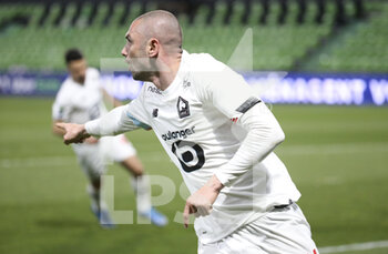 2021-04-09 - Burak Yilmaz of Lille celebrates his goal during the French championship Ligue 1 football match between FC Metz and Lille OSC (LOSC) on April 9, 2021 at Stade Saint-Symphorien in Metz, France - Photo Jean Catuffe / DPPI - FC METZ VS LILLE OSC (LOSC) - FRENCH LIGUE 1 - SOCCER