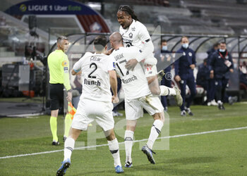 2021-04-09 - Burak Yilmaz of Lille celebrates his goal with Renato Sanches of Lille during the French championship Ligue 1 football match between FC Metz and Lille OSC (LOSC) on April 9, 2021 at Stade Saint-Symphorien in Metz, France - Photo Jean Catuffe / DPPI - FC METZ VS LILLE OSC (LOSC) - FRENCH LIGUE 1 - SOCCER