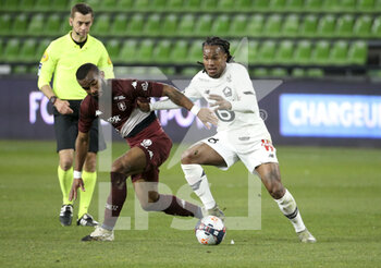 2021-04-09 - Renato Sanches of Lille, Habib Maiga of FC Metz (left) during the French championship Ligue 1 football match between FC Metz and Lille OSC (LOSC) on April 9, 2021 at Stade Saint-Symphorien in Metz, France - Photo Jean Catuffe / DPPI - FC METZ VS LILLE OSC (LOSC) - FRENCH LIGUE 1 - SOCCER