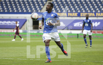 2021-04-10 - Lamine Kone of Strasbourg during the French championship Ligue 1 football match between RC Strasbourg Alsace (RCSA) and Paris Saint-Germain (PSG) on April 10, 2021 at La Meinau stadium in Strasbourg, France - Photo Jean Catuffe / DPPI - RC STRASBOURG AND PARIS SAINT-GERMAIN - FRENCH LIGUE 1 - SOCCER