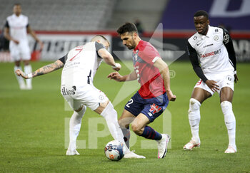 2021-04-16 - Mehmet Zeki Celik of Lille during the French championship Ligue 1 football match between LOSC and Montpellier HSC on April 16, 2021 at Pierre Mauroy stadium in Villeneuve-d'Ascq near Lille, France - Photo Jean Catuffe / DPPI - LOSC VS MONTPELLIER HSC - FRENCH LIGUE 1 - SOCCER