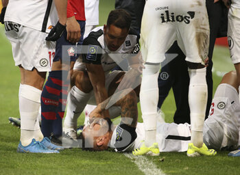 2021-04-16 - Pedro Mendes of Montpellier is badly injured during the French championship Ligue 1 football match between LOSC and Montpellier HSC on April 16, 2021 at Pierre Mauroy stadium in Villeneuve-d'Ascq near Lille, France - Photo Jean Catuffe / DPPI - LOSC VS MONTPELLIER HSC - FRENCH LIGUE 1 - SOCCER