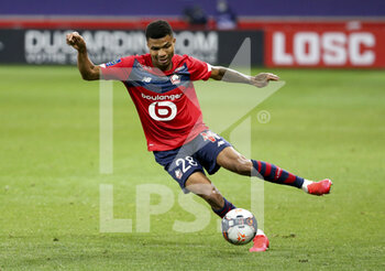 2021-04-16 - Reinildo Mandava of Lille during the French championship Ligue 1 football match between LOSC and Montpellier HSC on April 16, 2021 at Pierre Mauroy stadium in Villeneuve-d'Ascq near Lille, France - Photo Jean Catuffe / DPPI - LOSC VS MONTPELLIER HSC - FRENCH LIGUE 1 - SOCCER