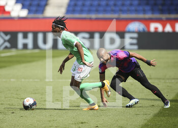 2021-04-18 - Yvan Neyou of Saint-Etienne, Rafael Alcantara aka Rafinha of PSG during the French championship Ligue 1 football match between Paris Saint-Germain (PSG) and AS Saint-Etienne (ASSE) on April 18, 2021 at Parc des Princes stadium in Paris, France - Photo Jean Catuffe / DPPI - PARIS SAINT-GERMAIN (PSG) VS AS SAINT-ETIENNE (ASSE) - FRENCH LIGUE 1 - SOCCER