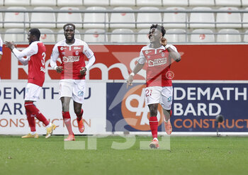 2021-04-23 - Nathanael Mbuku of Reims celebrates his goal during the French championship Ligue 1 football match between Stade de Reims and Olympique de Marseille on April 23, 2021 at Auguste Delaune stadium in Reims, France - Photo Loic Baratoux / DPPI - STADE DE REIMS VS OLYMPIQUE DE MARSEILLE (OM) - FRENCH LIGUE 1 - SOCCER