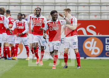 2021-04-23 - Nathanael Mbuku of Reims celebrates his goal during the French championship Ligue 1 football match between Stade de Reims and Olympique de Marseille on April 23, 2021 at Auguste Delaune stadium in Reims, France - Photo Loic Baratoux / DPPI - STADE DE REIMS VS OLYMPIQUE DE MARSEILLE (OM) - FRENCH LIGUE 1 - SOCCER