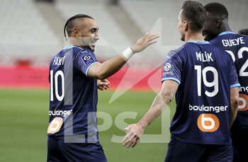 2021-04-23 - Dimitri Payet of Marseille celebrates his second goal with Arkadiusz Milik during the French championship Ligue 1 football match between Stade de Reims and Olympique de Marseille (OM) on April 23, 2021 at Stade Auguste Delaune in Reims, France - Photo Jean Catuffe / DPPI - STADE DE REIMS VS OLYMPIQUE DE MARSEILLE (OM) - FRENCH LIGUE 1 - SOCCER