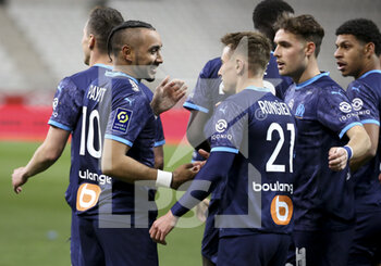 2021-04-23 - Dimitri Payet of Marseille celebrates his second goal with Arkadiusz Milik, Pol Lirola during the French championship Ligue 1 football match between Stade de Reims and Olympique de Marseille (OM) on April 23, 2021 at Stade Auguste Delaune in Reims, France - Photo Jean Catuffe / DPPI - STADE DE REIMS VS OLYMPIQUE DE MARSEILLE (OM) - FRENCH LIGUE 1 - SOCCER