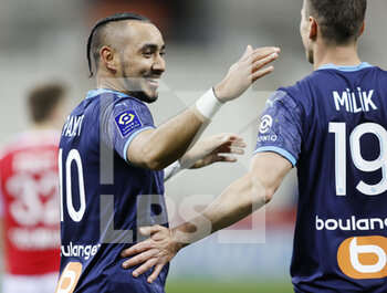 2021-04-23 - Dimitri Payet of OM celebrates after his second goal 1-3 with Arkadiusz Milik during the French championship Ligue 1 football match between Stade de Reims and Olympique de Marseille on April 23, 2021 at Auguste Delaune stadium in Reims, France - Photo Loic Baratoux / DPPI - STADE DE REIMS VS OLYMPIQUE DE MARSEILLE (OM) - FRENCH LIGUE 1 - SOCCER