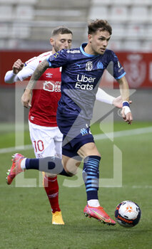 2021-04-23 - Pol Lirola of Marseille, Arber Zeneli of Reims during the French championship Ligue 1 football match between Stade de Reims and Olympique de Marseille (OM) on April 23, 2021 at Stade Auguste Delaune in Reims, France - Photo Jean Catuffe / DPPI - STADE DE REIMS VS OLYMPIQUE DE MARSEILLE (OM) - FRENCH LIGUE 1 - SOCCER