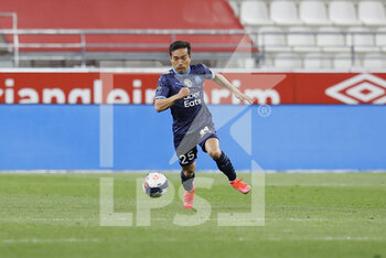 2021-04-23 - Yuto Nagatomo of OM during the French championship Ligue 1 football match between Stade de Reims and Olympique de Marseille on April 23, 2021 at Auguste Delaune stadium in Reims, France - Photo Loic Baratoux / DPPI - STADE DE REIMS VS OLYMPIQUE DE MARSEILLE (OM) - FRENCH LIGUE 1 - SOCCER