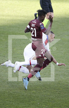 2021-04-24 - John Boye of FC Metz, Kylian Mbappe of PSG during the French championship Ligue 1 football match between FC Metz and Paris Saint-Germain (PSG) on April 24, 2021 at Stade Saint-Symphorien in Metz, France - Photo Jean Catuffe / DPPI - FC METZ VS PARIS SAINT-GERMAIN (PSG) - FRENCH LIGUE 1 - SOCCER