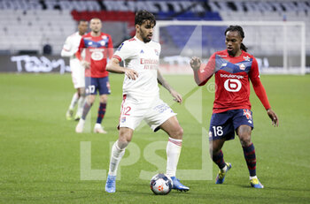 2021-04-25 - Lucas Paqueta of Lyon, Renato Sanches of Lille during the French championship Ligue 1 football match between Olympique Lyonnais (OL) and Lille OSC (LOSC) on April 25, 2021 at Groupama Stadium in Decines near Lyon, France - Photo Jean Catuffe / DPPI - OLYMPIQUE LYONNAIS (OL) VS LILLE OSC (LOSC) - FRENCH LIGUE 1 - SOCCER