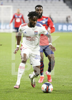 2021-04-25 - Maxwel Cornet of Lyon, Jonathan Bamba of Lille during the French championship Ligue 1 football match between Olympique Lyonnais (OL) and Lille OSC (LOSC) on April 25, 2021 at Groupama Stadium in Decines near Lyon, France - Photo Jean Catuffe / DPPI - OLYMPIQUE LYONNAIS (OL) VS LILLE OSC (LOSC) - FRENCH LIGUE 1 - SOCCER