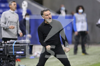 2021-04-25 - Coach of Lille OSC Christophe Galtier celebrates the victory during the French championship Ligue 1 football match between Olympique Lyonnais (OL) and Lille OSC (LOSC) on April 25, 2021 at Groupama Stadium in Decines near Lyon, France - Photo Jean Catuffe / DPPI - OLYMPIQUE LYONNAIS (OL) VS LILLE OSC (LOSC) - FRENCH LIGUE 1 - SOCCER