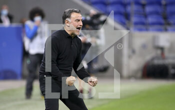 2021-04-25 - Coach of Lille OSC Christophe Galtier celebrates the victory during the French championship Ligue 1 football match between Olympique Lyonnais (OL) and Lille OSC (LOSC) on April 25, 2021 at Groupama Stadium in Decines near Lyon, France - Photo Jean Catuffe / DPPI - OLYMPIQUE LYONNAIS (OL) VS LILLE OSC (LOSC) - FRENCH LIGUE 1 - SOCCER