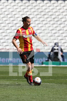 2021-04-25 - Captain Lens Yannick Cahuzac during the French championship Ligue 1 football match between RC Lens and Nimes Olympique at Bollaert-Delelis stadium in Lens, France - Photo Laurent Sanson / LS Medianord / DPPI - RC LENS VS NIMES OLYMPIQUE AT BOLLAERT-DELELIS STADIUM IN LENS, FRANCE - PHOTO LAURENT SANSON / LS MEDIANO - FRENCH LIGUE 1 - SOCCER