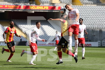 2021-04-25 - Corentin JEAN 25 Lens during the French championship Ligue 1 football match between RC Lens and Nimes Olympique at Bollaert-Delelis stadium in Lens, France - Photo Laurent Sanson / LS Medianord / DPPI - RC LENS VS NIMES OLYMPIQUE AT BOLLAERT-DELELIS STADIUM IN LENS, FRANCE - PHOTO LAURENT SANSON / LS MEDIANO - FRENCH LIGUE 1 - SOCCER