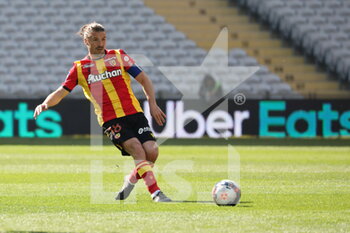 2021-04-25 - Yannick Cahuzac 18 captain RC Lens during the French championship Ligue 1 football match between RC Lens and Nimes Olympique at Bollaert-Delelis stadium in Lens, France - Photo Laurent Sanson / LS Medianord / DPPI - RC LENS VS NIMES OLYMPIQUE AT BOLLAERT-DELELIS STADIUM IN LENS, FRANCE - PHOTO LAURENT SANSON / LS MEDIANO - FRENCH LIGUE 1 - SOCCER