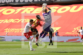 2021-04-25 - Baptiste Reynet goalkeeper Nimes during the French championship Ligue 1 football match between RC Lens and Nimes Olympique at Bollaert-Delelis stadium in Lens, France - Photo Laurent Sanson / LS Medianord / DPPI - RC LENS VS NIMES OLYMPIQUE AT BOLLAERT-DELELIS STADIUM IN LENS, FRANCE - PHOTO LAURENT SANSON / LS MEDIANO - FRENCH LIGUE 1 - SOCCER