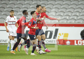 2021-05-01 - Burak Yilmaz of Lille (right) celebrates his goal with Jonathan Bamba, Luiz Araujo, Jose Fonte during the French championship Ligue 1 football match between Lille OSC (LOSC) and OGC Nice (OGCN) on May 1, 2021 at Stade Pierre Mauroy in Villeneuve-d'Ascq near Lille, France - Photo Jean Catuffe / DPPI - LILLE OSC (LOSC) VS OGC NICE (OGCN) - FRENCH LIGUE 1 - SOCCER