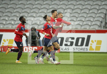 2021-05-01 - Burak Yilmaz of Lille celebrates his goal with Jonathan Bamba, Luiz Araujo, Jose Fonte during the French championship Ligue 1 football match between Lille OSC (LOSC) and OGC Nice (OGCN) on May 1, 2021 at Stade Pierre Mauroy in Villeneuve-d'Ascq near Lille, France - Photo Jean Catuffe / DPPI - LILLE OSC (LOSC) VS OGC NICE (OGCN) - FRENCH LIGUE 1 - SOCCER
