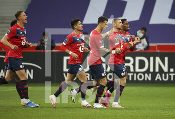 2021-05-01 - Burak Yilmaz of Lille celebrates his goal with Sven Botman, Luiz Araujo, Jose Fonte, Jonathan David during the French championship Ligue 1 football match between Lille OSC (LOSC) and OGC Nice (OGCN) on May 1, 2021 at Stade Pierre Mauroy in Villeneuve-d'Ascq near Lille, France - Photo Jean Catuffe / DPPI - LILLE OSC (LOSC) VS OGC NICE (OGCN) - FRENCH LIGUE 1 - SOCCER