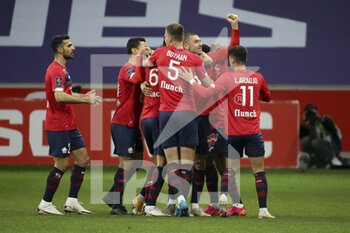 2021-05-01 - Burak Yilmaz of Lille celebrates his goal with teammates during the French championship Ligue 1 football match between Lille OSC (LOSC) and OGC Nice (OGCN) on May 1, 2021 at Stade Pierre Mauroy in Villeneuve-d'Ascq near Lille, France - Photo Jean Catuffe / DPPI - LILLE OSC (LOSC) VS OGC NICE (OGCN) - FRENCH LIGUE 1 - SOCCER