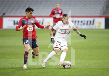 2021-05-01 - Rony Lopes of Nice, Luiz Araujo of Lille (left) during the French championship Ligue 1 football match between Lille OSC (LOSC) and OGC Nice (OGCN) on May 1, 2021 at Stade Pierre Mauroy in Villeneuve-d'Ascq near Lille, France - Photo Jean Catuffe / DPPI - LILLE OSC (LOSC) VS OGC NICE (OGCN) - FRENCH LIGUE 1 - SOCCER