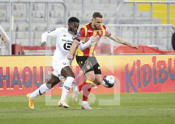 2021-05-07 - Jonathan Bamba of Lille, Jonathan Gradit of Lens during the French championship Ligue 1 football match between RC Lens and Lille OSC (LOSC) on May 7, 2021 at Stade Bollaert-Delelis in Lens, France - Photo Jean Catuffe / DPPI - RC LENS VS LOSC - FRENCH LIGUE 1 - SOCCER