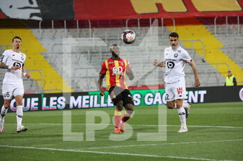 2021-05-07 - GANAGO 9 Lens and CELIK 2 LOSC during the French championship Ligue 1 football match between RC Lens and LOSC on May 7, 2021 at Bollaert-Delelis stadium in Lens, France - Photo Laurent Sanson / LS Medianord / DPPI - RC LENS VS LOSC - FRENCH LIGUE 1 - SOCCER