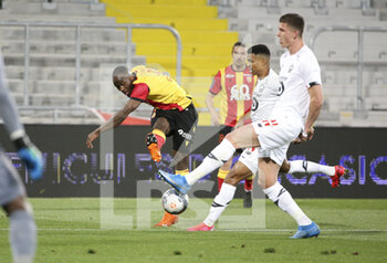 2021-05-07 - Ignatius Ganago of Lens, Reinildo Mandava, Sven Botman of Lille during the French championship Ligue 1 football match between RC Lens and Lille OSC (LOSC) on May 7, 2021 at Stade Bollaert-Delelis in Lens, France - Photo Jean Catuffe / DPPI - RC LENS VS LOSC - FRENCH LIGUE 1 - SOCCER